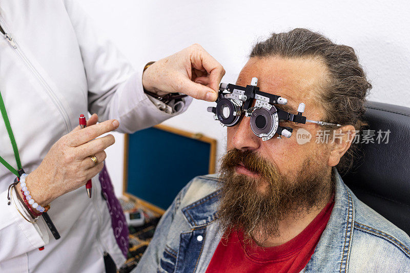 Optician and optometrist. Eye doctor helps your patient with their visual health.